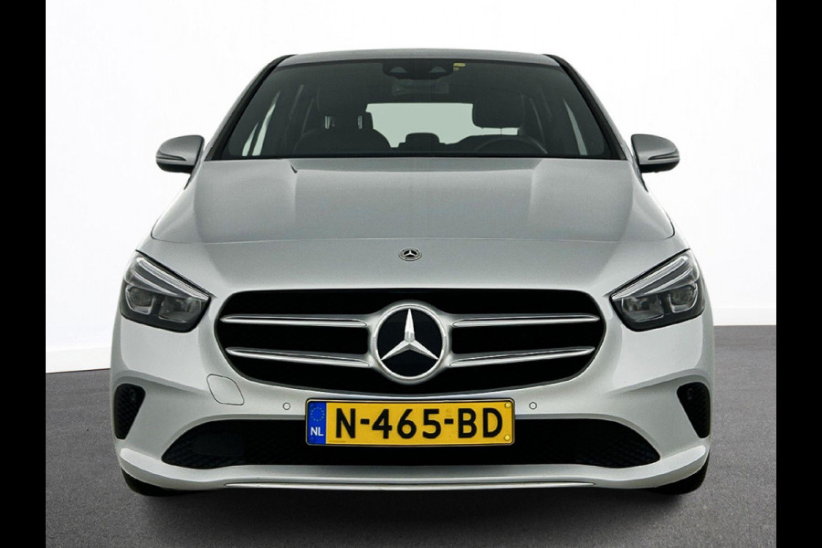 Mercedes-Benz B-Klasse 180 Business Solution Luxury Auto. Trekhaak Navigatie Camera Parkeersensoren Cruise Control Elektrische achterklep Stoelverwarming Virtual Cockpit Leder Climate Control