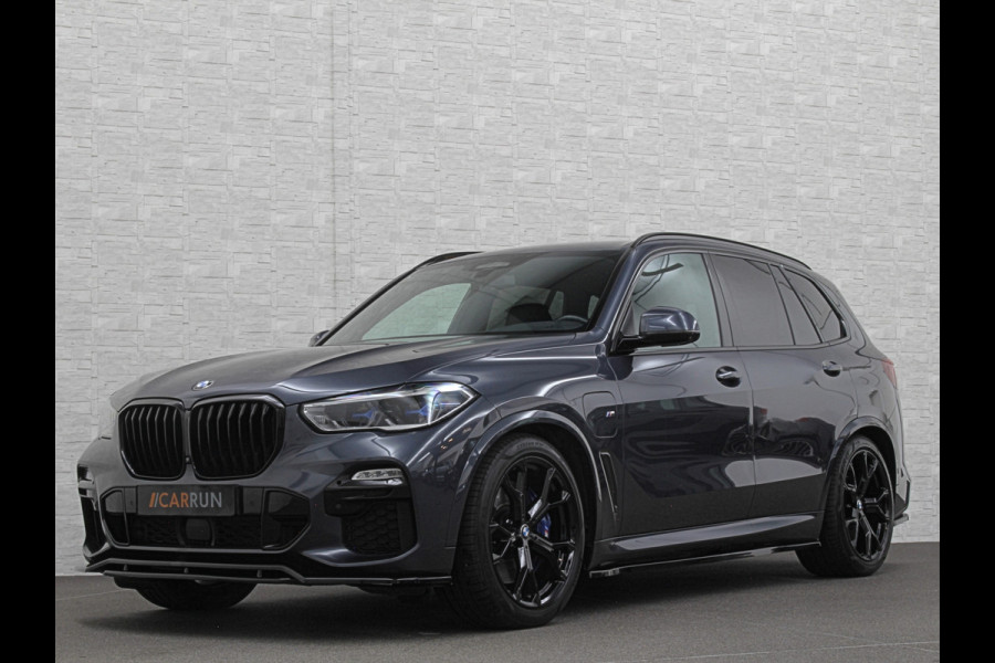 BMW X5 45e M-Stoelen | M-Performance | 360 Camera | ACC | Indiv. Leder | Harman-Kardon | Laser-LED | Keyless-Entry | Stoelventilatie | Head-Up | Memory | 21'' | Sfeerverlichting | Trekhaak | Luchtvering | Rij-Assistent Pro | Carplay | Black-Optic | Draadloos Laden. BMW X5 45e M-Stoelen | M-Performance | 360 Camera | ACC | Indiv. Leder | Harman-Kardon | Laser-LED | Keyless-Entry | Stoelventilatie | Head-Up | Memory | 21'' | Sfeerverlichting | Trekhaak | Luchtvering | Rij-Assistent Pro | Carplay | Black-Optic | Draadloos Laden.
