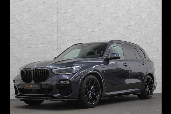 BMW X5 45e M-Stoelen | M-Performance | 360 Camera | ACC | Indiv. Leder | Harman-Kardon | Laser-LED | Keyless-Entry | Stoelventilatie | Head-Up | Memory | 21'' | Sfeerverlichting | Trekhaak | Luchtvering | Rij-Assistent Pro | Carplay | Black-Optic | Draadloos Laden. BMW X5 45e M-Stoelen | M-Performance | 360 Camera | ACC | Indiv. Leder | Harman-Kardon | Laser-LED | Keyless-Entry | Stoelventilatie | Head-Up | Memory | 21'' | Sfeerverlichting | Trekhaak | Luchtvering | Rij-Assistent Pro | Carplay | Black-Optic | Draadloos Laden.