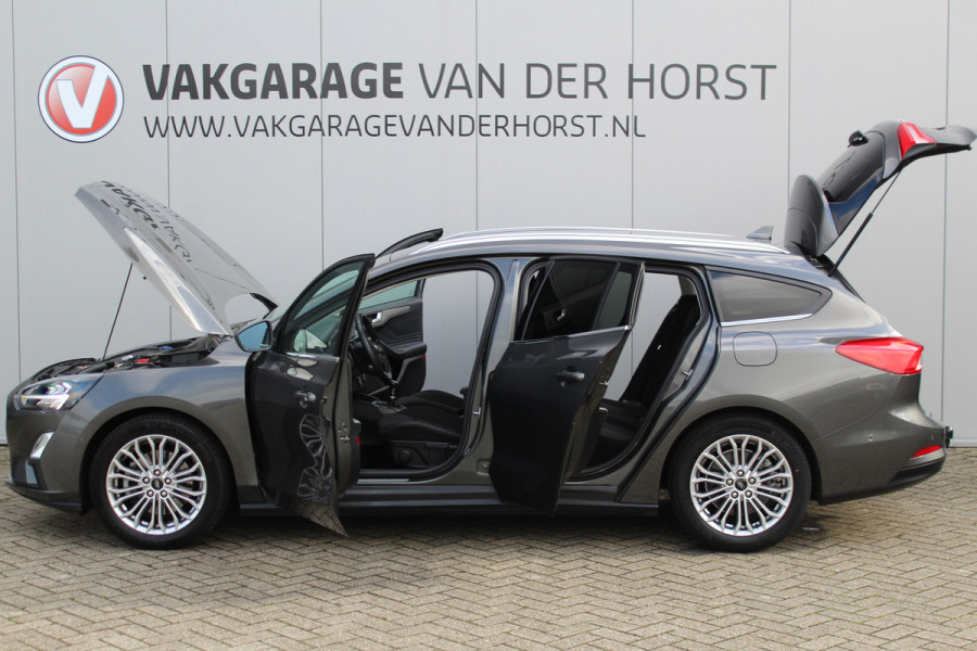 Ford FOCUS Wagon 1.0-125pk EcoBoost Titanium Business. Uiterst nette, comfortabele en ruime stationcar. Stoel-, stuur- en voorraamverw., Trekhaak, B&O soundsyst, lane assist, adaptieve cruise cntrl, camera a, LM wln, navigatie, telefoonvoorb. etc Ford FOCUS Wagon 1.0-125pk EcoBoost Titanium Business. Uiterst nette, comfortabele en ruime stationcar. Stoel-, stuur- en voorraamverw., Trekhaak, B&O soundsyst, lane assist, adaptieve cruise cntrl, camera a, LM wln, navigatie, telefoonvoorb. etc