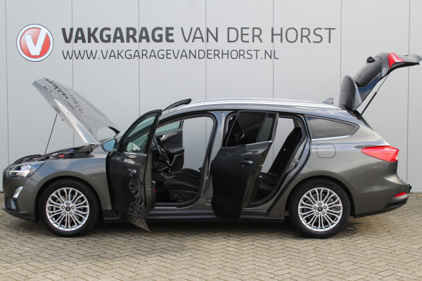 Ford FOCUS Wagon 1.0-125pk EcoBoost Titanium Business. Uiterst nette, comfortabele en ruime stationcar. Stoel-, stuur- en voorraamverw., Trekhaak, B&O soundsyst, lane assist, adaptieve cruise cntrl, camera a, LM wln, navigatie, telefoonvoorb. etc Ford FOCUS Wagon 1.0-125pk EcoBoost Titanium Business. Uiterst nette, comfortabele en ruime stationcar. Stoel-, stuur- en voorraamverw., Trekhaak, B&O soundsyst, lane assist, adaptieve cruise cntrl, camera a, LM wln, navigatie, telefoonvoorb. etc