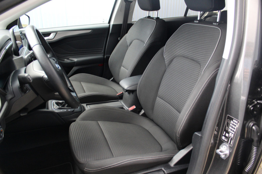 Ford FOCUS Wagon 1.0-125pk EcoBoost Titanium Business. Uiterst nette, comfortabele en ruime stationcar. Stoel-, stuur- en voorraamverw., Trekhaak, B&O soundsyst, lane assist, adaptieve cruise cntrl, camera a, LM wln, navigatie, telefoonvoorb. etc Ford FOCUS Wagon 1.0-125pk EcoBoost Titanium Business. Uiterst nette, comfortabele en ruime stationcar. Stoel-, stuur- en voorraamverw., Trekhaak, B&O soundsyst, lane assist, adaptieve cruise cntrl, camera a, LM wln, navigatie, telefoonvoorb. etc