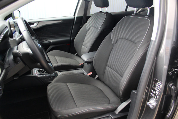 Ford FOCUS Wagon 1.0-125pk EcoBoost Titanium Business. Uiterst nette, comfortabele en ruime stationcar. Stoel-, stuur- en voorraamverw., Trekhaak, B&O soundsyst, lane assist, adaptieve cruise cntrl, camera a, LM wln, navigatie, telefoonvoorb. etc Ford FOCUS Wagon 1.0-125pk EcoBoost Titanium Business. Uiterst nette, comfortabele en ruime stationcar. Stoel-, stuur- en voorraamverw., Trekhaak, B&O soundsyst, lane assist, adaptieve cruise cntrl, camera a, LM wln, navigatie, telefoonvoorb. etc