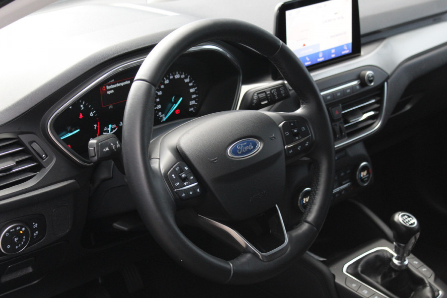 Ford FOCUS Wagon 1.0-125pk EcoBoost Titanium Business. Uiterst nette, comfortabele en ruime stationcar. Stoel-, stuur- en voorraamverw., Trekhaak, B&O soundsyst, lane assist, adaptieve cruise cntrl, camera a, LM wln, navigatie, telefoonvoorb. etc Ford FOCUS Wagon 1.0-125pk EcoBoost Titanium Business. Uiterst nette, comfortabele en ruime stationcar. Stoel-, stuur- en voorraamverw., Trekhaak, B&O soundsyst, lane assist, adaptieve cruise cntrl, camera a, LM wln, navigatie, telefoonvoorb. etc