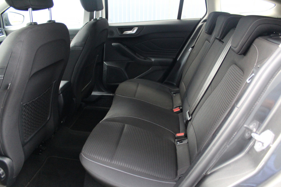 Ford FOCUS Wagon 1.0-125pk EcoBoost Titanium Business. Uiterst nette, comfortabele en ruime stationcar. Stoel-, stuur- en voorraamverw., Trekhaak, B&O soundsyst, lane assist, adaptieve cruise cntrl, camera a, LM wln, navigatie, telefoonvoorb. etc Ford FOCUS Wagon 1.0-125pk EcoBoost Titanium Business. Uiterst nette, comfortabele en ruime stationcar. Stoel-, stuur- en voorraamverw., Trekhaak, B&O soundsyst, lane assist, adaptieve cruise cntrl, camera a, LM wln, navigatie, telefoonvoorb. etc