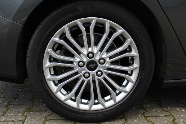 Ford FOCUS Wagon 1.0-125pk EcoBoost Titanium Business. Uiterst nette, comfortabele en ruime stationcar. Stoel-, stuur- en voorraamverw., Trekhaak, B&O soundsyst, lane assist, adaptieve cruise cntrl, camera a, LM wln, navigatie, telefoonvoorb. etc Ford FOCUS Wagon 1.0-125pk EcoBoost Titanium Business. Uiterst nette, comfortabele en ruime stationcar. Stoel-, stuur- en voorraamverw., Trekhaak, B&O soundsyst, lane assist, adaptieve cruise cntrl, camera a, LM wln, navigatie, telefoonvoorb. etc