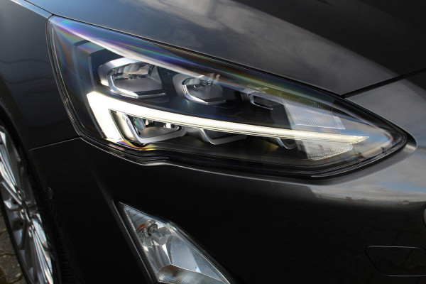 Ford FOCUS Wagon 1.0-125pk EcoBoost Titanium Business. Uiterst nette, comfortabele en ruime stationcar. Stoel-, stuur- en voorraamverw., Trekhaak, B&O soundsyst, lane assist, adaptieve cruise cntrl, camera a, LM wln, navigatie, telefoonvoorb. etc Ford FOCUS Wagon 1.0-125pk EcoBoost Titanium Business. Uiterst nette, comfortabele en ruime stationcar. Stoel-, stuur- en voorraamverw., Trekhaak, B&O soundsyst, lane assist, adaptieve cruise cntrl, camera a, LM wln, navigatie, telefoonvoorb. etc