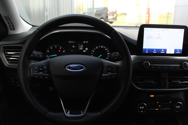 Ford FOCUS Wagon 1.0-125pk EcoBoost Titanium Business. Uiterst nette, comfortabele en ruime stationcar. Stoel-, stuur- en voorraamverw., Trekhaak, B&O soundsyst, lane assist, adaptieve cruise cntrl, camera a, LM wln, navigatie, telefoonvoorb. etc Ford FOCUS Wagon 1.0-125pk EcoBoost Titanium Business. Uiterst nette, comfortabele en ruime stationcar. Stoel-, stuur- en voorraamverw., Trekhaak, B&O soundsyst, lane assist, adaptieve cruise cntrl, camera a, LM wln, navigatie, telefoonvoorb. etc