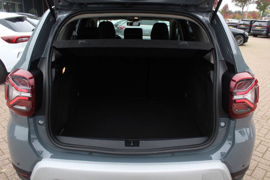 Dacia Duster 1.0 TCe 100 Bi-Fuel Journey / Full option! / Trekhaak / Camera / Half leder / 17'' / Keyless / Navigatie / DAB / Stoelverwarming / Cruise Control