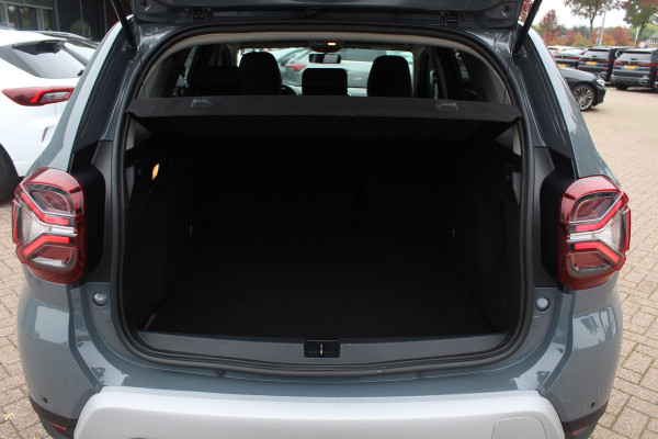Dacia Duster 1.0 TCe 100 Bi-Fuel Journey / Full option! / Trekhaak / Camera / Half leder / 17'' / Keyless / Navigatie / DAB / Stoelverwarming / Cruise Control
