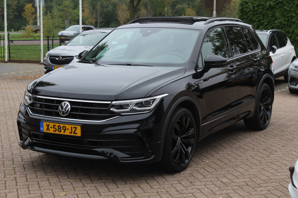 Volkswagen Tiguan 1.5 TSI R-Line Business+ / Trekhaak / Panoramadak / 360Camera / Head-up / Leder / 20'' / Memory seats / Dodehoek / Navigatie / Stoelverwarming 4x / Stuurverwarming / DAB / ACC Volkswagen Tiguan 1.5 TSI R-Line Business+ / Trekhaak / Panoramadak / 360Camera / Head-up / Leder / 20'' / Memory seats / Dodehoek / Navigatie / Stoelverwarming 4x / Stuurverwarming / DAB / ACC