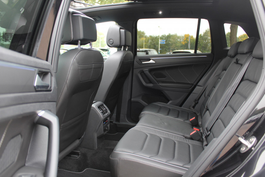 Volkswagen Tiguan 1.5 TSI R-Line Business+ / Trekhaak / Panoramadak / 360Camera / Head-up / Leder / 20'' / Memory seats / Dodehoek / Navigatie / Stoelverwarming 4x / Stuurverwarming / DAB / ACC Volkswagen Tiguan 1.5 TSI R-Line Business+ / Trekhaak / Panoramadak / 360Camera / Head-up / Leder / 20'' / Memory seats / Dodehoek / Navigatie / Stoelverwarming 4x / Stuurverwarming / DAB / ACC