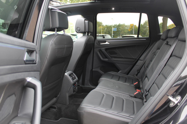 Volkswagen Tiguan 1.5 TSI R-Line Business+ / Trekhaak / Panoramadak / 360Camera / Head-up / Leder / 20'' / Memory seats / Dodehoek / Navigatie / Stoelverwarming 4x / Stuurverwarming / DAB / ACC Volkswagen Tiguan 1.5 TSI R-Line Business+ / Trekhaak / Panoramadak / 360Camera / Head-up / Leder / 20'' / Memory seats / Dodehoek / Navigatie / Stoelverwarming 4x / Stuurverwarming / DAB / ACC