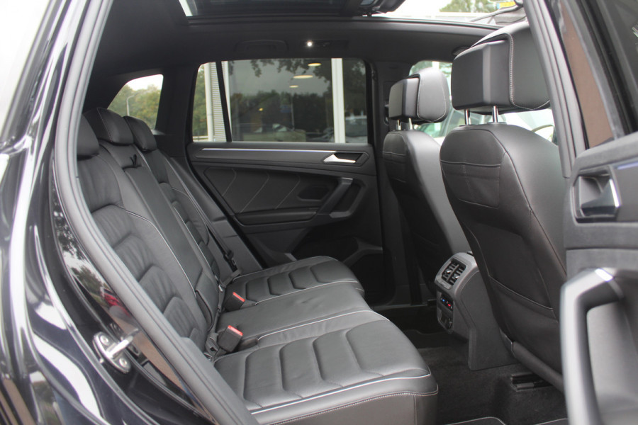 Volkswagen Tiguan 1.5 TSI R-Line Business+ / Trekhaak / Panoramadak / 360Camera / Head-up / Leder / 20'' / Memory seats / Dodehoek / Navigatie / Stoelverwarming 4x / Stuurverwarming / DAB / ACC Volkswagen Tiguan 1.5 TSI R-Line Business+ / Trekhaak / Panoramadak / 360Camera / Head-up / Leder / 20'' / Memory seats / Dodehoek / Navigatie / Stoelverwarming 4x / Stuurverwarming / DAB / ACC