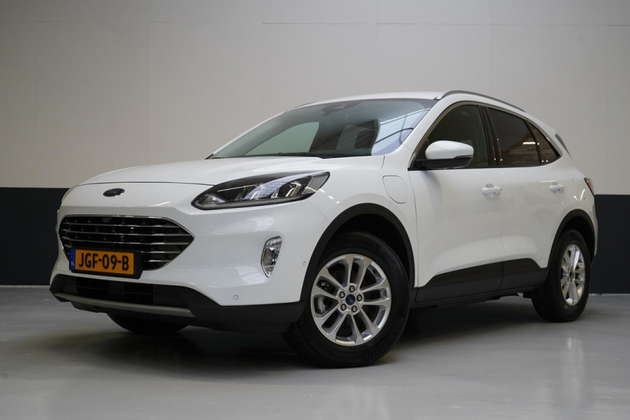 Ford Kuga 2.5 PHEV Titanium | Winter-pack | Adapt. Cruise | Voorruitverwarming | Privacy Glass | Navigatie | Climate airco