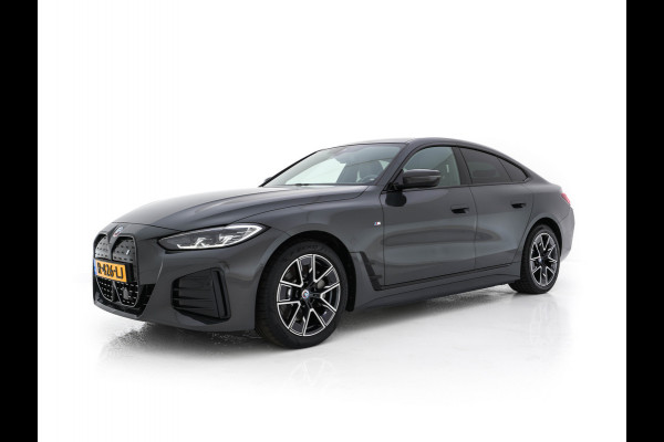 BMW i4 eDrive40 84 kWh M-Sportpack [ 3-Fase ] { SOH-95%} (INCL-BTW) *LEATHER-ALCANTARA | FULL-LED | ADAPTIVE-CRUISE | WIDE-SCREEN-DIGI-COCKPIT | DAB+ | CAMERA | AMBIENT-LIGHT | CARPLAY | SPORT-SEATS | PRIVACY-GLASS | TOWBAR | 18''ALU*