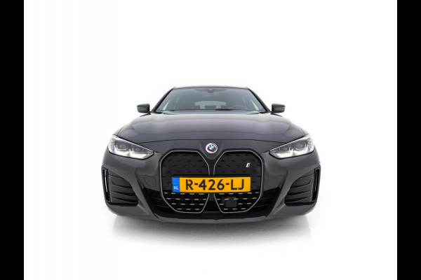 BMW i4 eDrive40 84 kWh M-Sportpack [ 3-Fase ] { SOH-95%} (INCL-BTW) *LEATHER-ALCANTARA | FULL-LED | ADAPTIVE-CRUISE | WIDE-SCREEN-DIGI-COCKPIT | DAB+ | CAMERA | AMBIENT-LIGHT | CARPLAY | SPORT-SEATS | PRIVACY-GLASS | TOWBAR | 18''ALU*