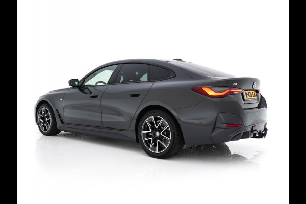 BMW i4 eDrive40 84 kWh M-Sportpack [ 3-Fase ] { SOH-95%} (INCL-BTW) *LEATHER-ALCANTARA | FULL-LED | ADAPTIVE-CRUISE | WIDE-SCREEN-DIGI-COCKPIT | DAB+ | CAMERA | AMBIENT-LIGHT | CARPLAY | SPORT-SEATS | PRIVACY-GLASS | TOWBAR | 18''ALU*