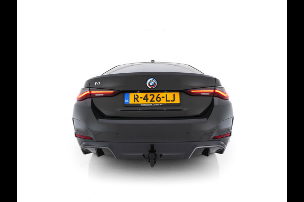 BMW i4 eDrive40 84 kWh M-Sportpack [ 3-Fase ] { SOH-95%} (INCL-BTW) *LEATHER-ALCANTARA | FULL-LED | ADAPTIVE-CRUISE | WIDE-SCREEN-DIGI-COCKPIT | DAB+ | CAMERA | AMBIENT-LIGHT | CARPLAY | SPORT-SEATS | PRIVACY-GLASS | TOWBAR | 18''ALU*