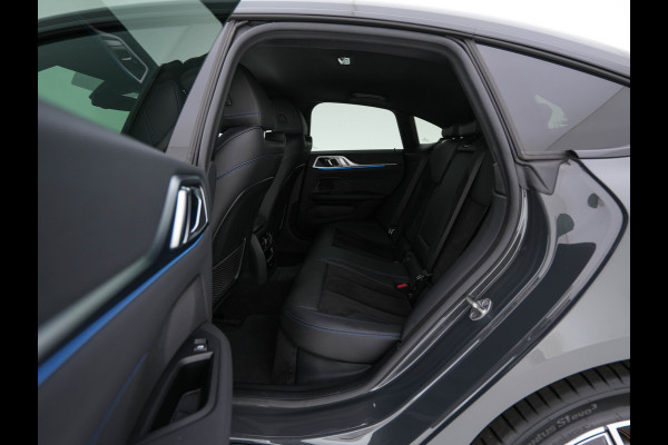 BMW i4 eDrive40 84 kWh M-Sportpack [ 3-Fase ] { SOH-95%} (INCL-BTW) *LEATHER-ALCANTARA | FULL-LED | ADAPTIVE-CRUISE | WIDE-SCREEN-DIGI-COCKPIT | DAB+ | CAMERA | AMBIENT-LIGHT | CARPLAY | SPORT-SEATS | PRIVACY-GLASS | TOWBAR | 18''ALU*