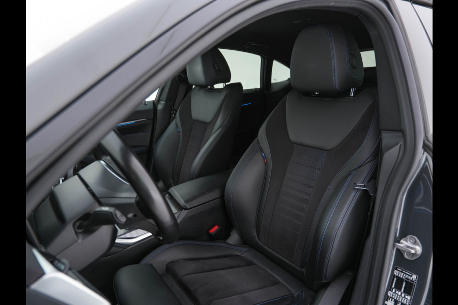 BMW i4 eDrive40 84 kWh M-Sportpack [ 3-Fase ] { SOH-95%} (INCL-BTW) *LEATHER-ALCANTARA | FULL-LED | ADAPTIVE-CRUISE | WIDE-SCREEN-DIGI-COCKPIT | DAB+ | CAMERA | AMBIENT-LIGHT | CARPLAY | SPORT-SEATS | PRIVACY-GLASS | TOWBAR | 18''ALU*