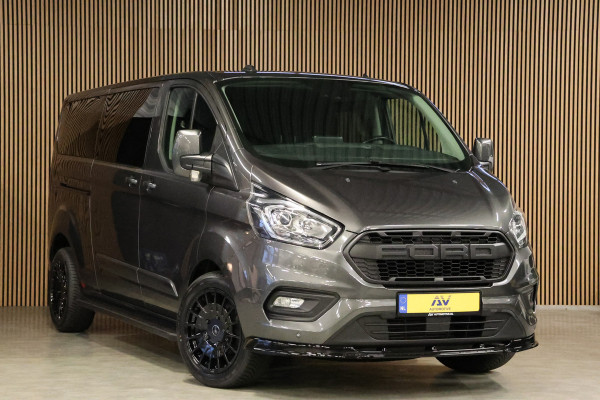 Ford Transit Custom 300 2.0 TDCI L2H1 170 PK Limited DC | B-Xenon | Blind Spot | CarPlay | Camera | Navigatie | Stoelverwarming | Trekhaak | L+R Schuifdeur | PDC V+A | MF Stuur | Dubbel cabine | 5-Zitter | Nieuwe APK | NAP Logisch Ford Transit Custom 300 2.0 TDCI L2H1 170 PK Limited DC | B-Xenon | Blind Spot | CarPlay | Camera | Navigatie | Stoelverwarming | Trekhaak | L+R Schuifdeur | PDC V+A | MF Stuur | Dubbel cabine | 5-Zitter | Nieuwe APK | NAP Logisch