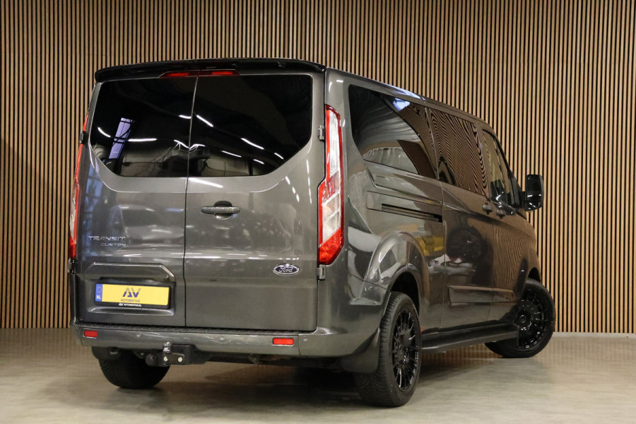 Ford Transit Custom 300 2.0 TDCI L2H1 170 PK Limited DC | B-Xenon | Blind Spot | CarPlay | Camera | Navigatie | Stoelverwarming | Trekhaak | L+R Schuifdeur | PDC V+A | MF Stuur | Dubbel cabine | 5-Zitter | Nieuwe APK | NAP Logisch Ford Transit Custom 300 2.0 TDCI L2H1 170 PK Limited DC | B-Xenon | Blind Spot | CarPlay | Camera | Navigatie | Stoelverwarming | Trekhaak | L+R Schuifdeur | PDC V+A | MF Stuur | Dubbel cabine | 5-Zitter | Nieuwe APK | NAP Logisch