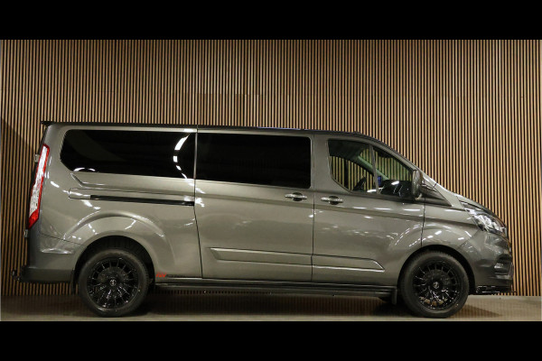 Ford Transit Custom 300 2.0 TDCI L2H1 170 PK Limited DC | B-Xenon | Blind Spot | CarPlay | Camera | Navigatie | Stoelverwarming | Trekhaak | L+R Schuifdeur | PDC V+A | MF Stuur | Dubbel cabine | 5-Zitter | Nieuwe APK | NAP Logisch Ford Transit Custom 300 2.0 TDCI L2H1 170 PK Limited DC | B-Xenon | Blind Spot | CarPlay | Camera | Navigatie | Stoelverwarming | Trekhaak | L+R Schuifdeur | PDC V+A | MF Stuur | Dubbel cabine | 5-Zitter | Nieuwe APK | NAP Logisch