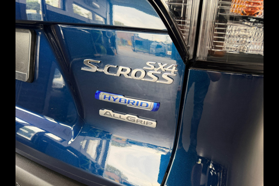 Suzuki S-Cross 1.4 Boosterjet AllGrip Style Smart Hybrid | Nieuwstaat | 12.000km | Navi |1e eigenaar | Camera | ACC | Stoelverw. Suzuki S-Cross 1.4 Boosterjet AllGrip Style Smart Hybrid | Nieuwstaat | 12.000km | Navi |1e eigenaar | Camera | ACC | Stoelverw.