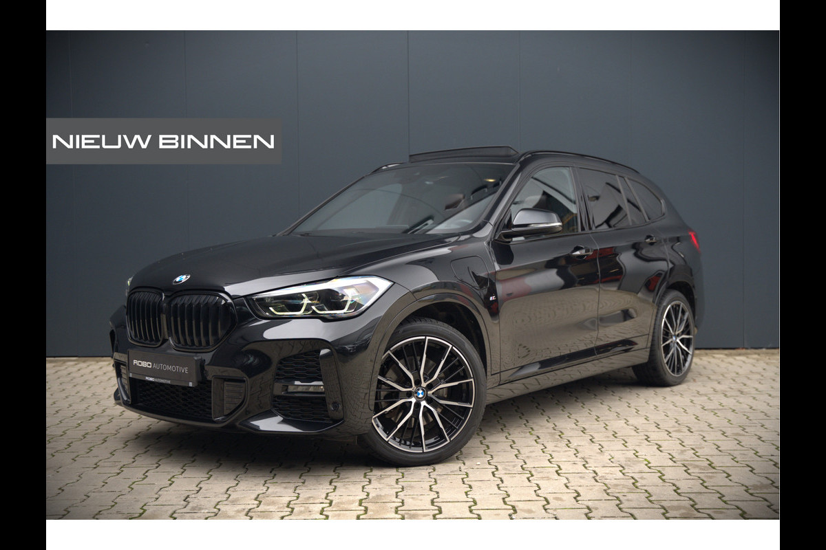 BMW X1 xDrive25e Business Edition Plus M Sport | Panoramadak | Leer | Head-Up Display | Camera | Shadowline | Keyless | Cruise Control | Navigatie Prof. | Stoelverwarming | Elek. Achterklep | Ambiance Verlichting BMW X1 xDrive25e Business Edition Plus M Sport | Panoramadak | Leer | Head-Up Display | Camera | Shadowline | Keyless | Cruise Control | Navigatie Prof. | Stoelverwarming | Elek. Achterklep | Ambiance Verlichting