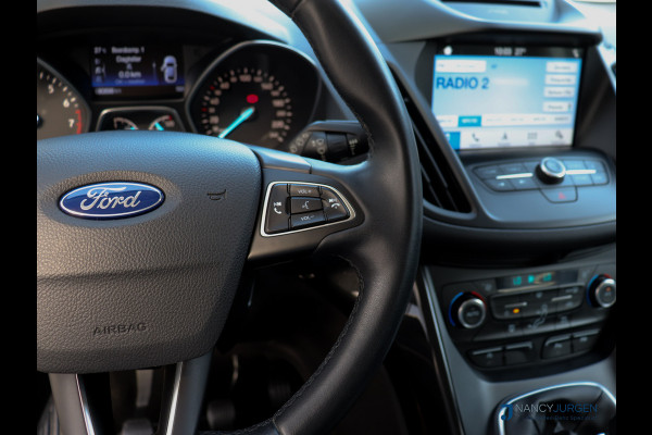 Ford Kuga 1.5 EcoBoost | Titanium | Pano | Navi | Camera | 17" LM Velgen | Elektr. Uitklapb. trekhaak | Volledig gedocumenteerd Onderhoudsboekje | Incl. 12 maanden Car Garantie Ford Kuga 1.5 EcoBoost | Titanium | Pano | Navi | Camera | 17" LM Velgen | Elektr. Uitklapb. trekhaak | Volledig gedocumenteerd Onderhoudsboekje | Incl. 12 maanden Car Garantie