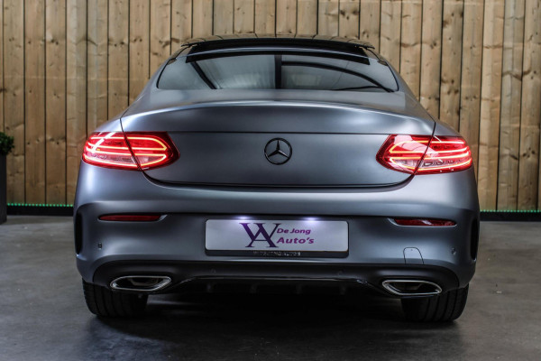 Mercedes-Benz C-Klasse Coupé 180 AMG *Pano*Camera*Magno kleur*Multibeam* Mercedes-Benz C-Klasse Coupé 180 AMG *Pano*Camera*Magno kleur*Multibeam*