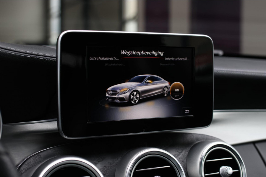 Mercedes-Benz C-Klasse Coupé 180 AMG *Pano*Camera*Magno kleur*Multibeam* Mercedes-Benz C-Klasse Coupé 180 AMG *Pano*Camera*Magno kleur*Multibeam*