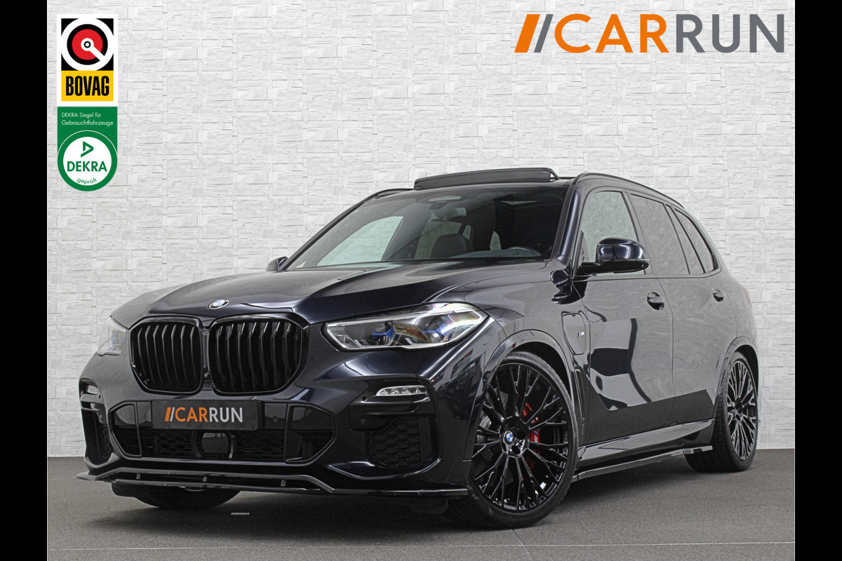 BMW X5 xDrive45e M-Sport | Panorama | 360 Camera | 96% SOH | ACC | Leder Indiv. | Laser-LED | Harman-Kardon | Rij-Assistent Pro | Memory | Head-Up | Trekhaak | 4-Zone Clima | Beker Koeling & Verwarming | Stuurverwarming | Comfortstoelen | Keyless-Entry | M-Gordels | Sfeerverlichting | Carplay | BMW X5 xDrive45e M-Sport | Panorama | 360 Camera | 96% SOH | ACC | Leder Indiv. | Laser-LED | Harman-Kardon | Rij-Assistent Pro | Memory | Head-Up | Trekhaak | 4-Zone Clima | Beker Koeling & Verwarming | Stuurverwarming | Comfortstoelen | Keyless-Entry | M-Gordels | Sfeerverlichting | Carplay |