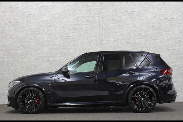 BMW X5 xDrive45e M-Sport | Panorama | 360 Camera | 96% SOH | ACC | Leder Indiv. | Laser-LED | Harman-Kardon | Rij-Assistent Pro | Memory | Head-Up | Trekhaak | 4-Zone Clima | Beker Koeling & Verwarming | Stuurverwarming | Comfortstoelen | Keyless-Entry | M-Gordels | Sfeerverlichting | Carplay |