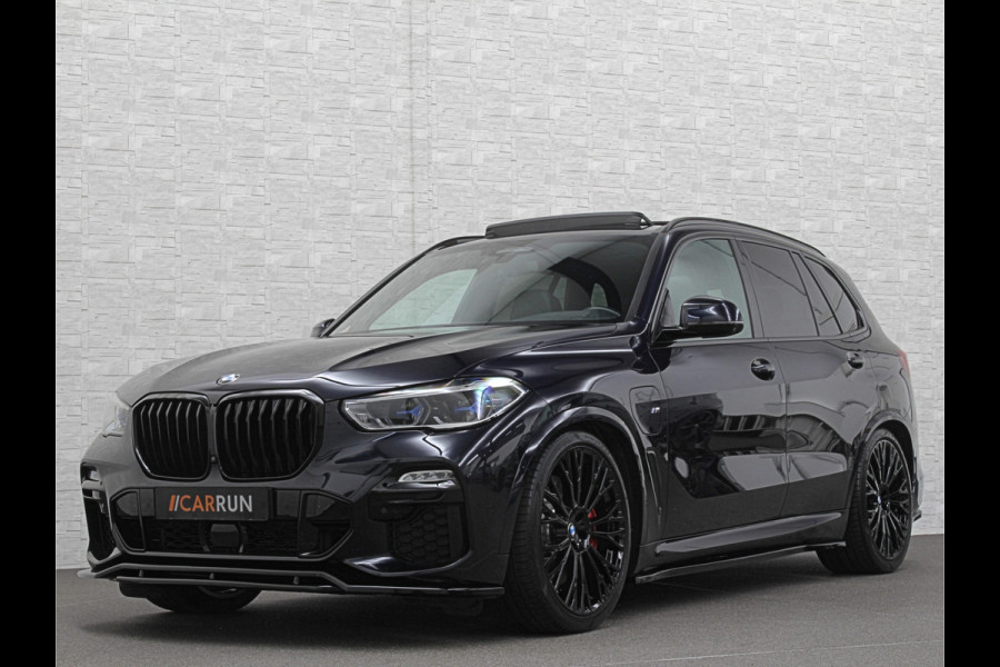 BMW X5 xDrive45e M-Sport | Panorama | 360 Camera | 96% SOH | ACC | Leder Indiv. | Laser-LED | Harman-Kardon | Rij-Assistent Pro | Memory | Head-Up | Trekhaak | 4-Zone Clima | Beker Koeling & Verwarming | Stuurverwarming | Comfortstoelen | Keyless-Entry | M-Gordels | Sfeerverlichting | Carplay |