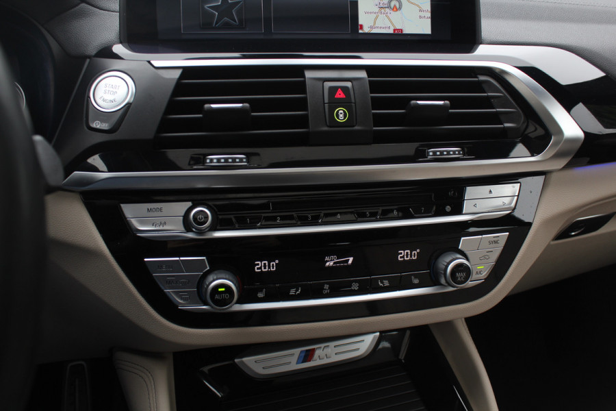BMW X4 M40i High Executive / Trekhaak / Panoramadak / Camera / Head-up / Luxe Leder / 21'' / Harman Kardon / Navigatie / Stuur+Stoelverwarming / DAB / Dodehoek / Cruise Control BMW X4 M40i High Executive / Trekhaak / Panoramadak / Camera / Head-up / Luxe Leder / 21'' / Harman Kardon / Navigatie / Stuur+Stoelverwarming / DAB / Dodehoek / Cruise Control