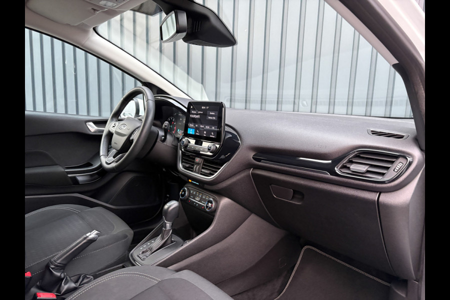 Ford Fiesta 1.0 EcoB. Aut. Titanium | Trekhaak | Stoel & Stuur verw. | Camera | Navi | PDC V&A | Prijs Rijklaar!! Ford Fiesta 1.0 EcoB. Aut. Titanium | Trekhaak | Stoel & Stuur verw. | Camera | Navi | PDC V&A | Prijs Rijklaar!!