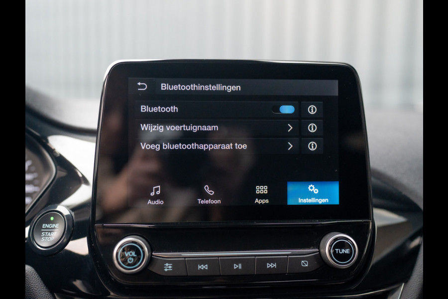 Ford Fiesta 1.0 EcoB. Aut. Titanium | Trekhaak | Stoel & Stuur verw. | Camera | Navi | PDC V&A | Prijs Rijklaar!! Ford Fiesta 1.0 EcoB. Aut. Titanium | Trekhaak | Stoel & Stuur verw. | Camera | Navi | PDC V&A | Prijs Rijklaar!!