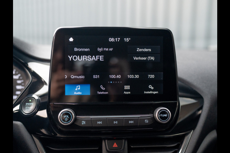 Ford Fiesta 1.0 EcoB. Aut. Titanium | Trekhaak | Stoel & Stuur verw. | Camera | Navi | PDC V&A | Prijs Rijklaar!! Ford Fiesta 1.0 EcoB. Aut. Titanium | Trekhaak | Stoel & Stuur verw. | Camera | Navi | PDC V&A | Prijs Rijklaar!!