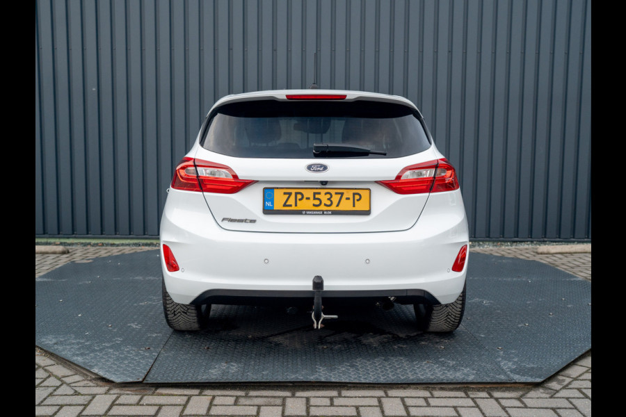 Ford Fiesta 1.0 EcoB. Aut. Titanium | Trekhaak | Stoel & Stuur verw. | Camera | Navi | PDC V&A | Prijs Rijklaar!! Ford Fiesta 1.0 EcoB. Aut. Titanium | Trekhaak | Stoel & Stuur verw. | Camera | Navi | PDC V&A | Prijs Rijklaar!!