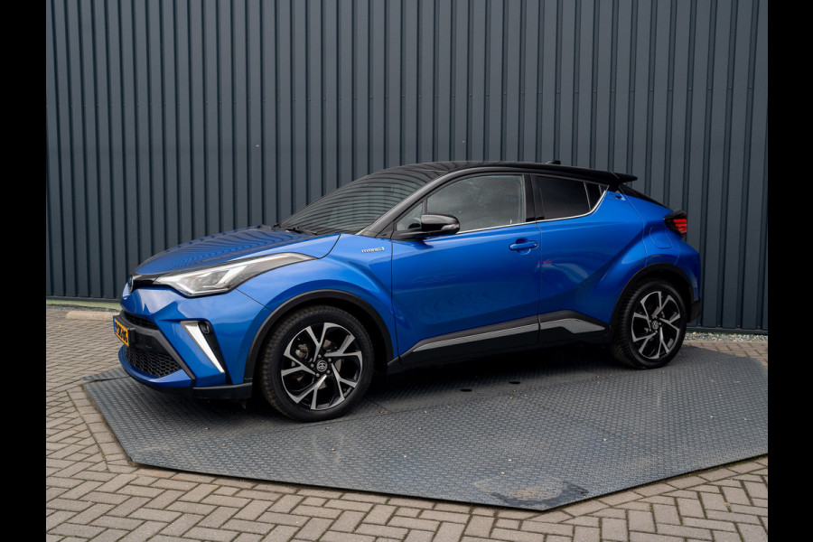 Toyota C-HR 1.8 Hybrid First Edition | Bi-Tone | JBL | Blind Spot | Navi | Pakeersensoren | Apple Carplay | Prijs Rijklaar!! Toyota C-HR 1.8 Hybrid First Edition | Bi-Tone | JBL | Blind Spot | Navi | Pakeersensoren | Apple Carplay | Prijs Rijklaar!!