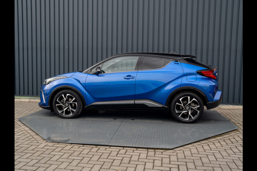 Toyota C-HR 1.8 Hybrid First Edition | Bi-Tone | JBL | Blind Spot | Navi | Pakeersensoren | Apple Carplay | Prijs Rijklaar!! Toyota C-HR 1.8 Hybrid First Edition | Bi-Tone | JBL | Blind Spot | Navi | Pakeersensoren | Apple Carplay | Prijs Rijklaar!!