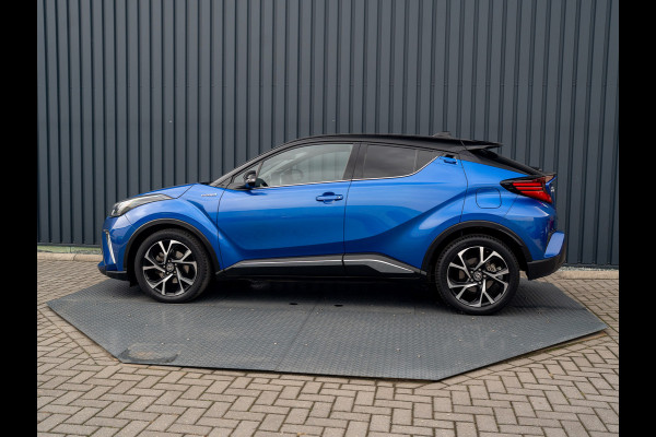 Toyota C-HR 1.8 Hybrid First Edition | Bi-Tone | JBL | Blind Spot | Navi | Pakeersensoren | Apple Carplay | Prijs Rijklaar!! Toyota C-HR 1.8 Hybrid First Edition | Bi-Tone | JBL | Blind Spot | Navi | Pakeersensoren | Apple Carplay | Prijs Rijklaar!!