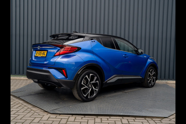 Toyota C-HR 1.8 Hybrid First Edition | Bi-Tone | JBL | Blind Spot | Navi | Pakeersensoren | Apple Carplay | Prijs Rijklaar!! Toyota C-HR 1.8 Hybrid First Edition | Bi-Tone | JBL | Blind Spot | Navi | Pakeersensoren | Apple Carplay | Prijs Rijklaar!!