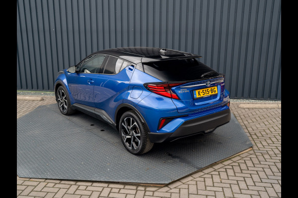Toyota C-HR 1.8 Hybrid First Edition | Bi-Tone | JBL | Blind Spot | Navi | Pakeersensoren | Apple Carplay | Prijs Rijklaar!! Toyota C-HR 1.8 Hybrid First Edition | Bi-Tone | JBL | Blind Spot | Navi | Pakeersensoren | Apple Carplay | Prijs Rijklaar!!