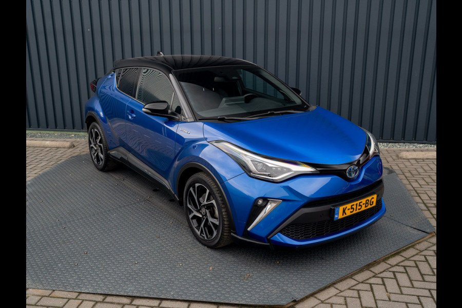Toyota C-HR 1.8 Hybrid First Edition | Bi-Tone | JBL | Blind Spot | Navi | Pakeersensoren | Apple Carplay | Prijs Rijklaar!! Toyota C-HR 1.8 Hybrid First Edition | Bi-Tone | JBL | Blind Spot | Navi | Pakeersensoren | Apple Carplay | Prijs Rijklaar!!