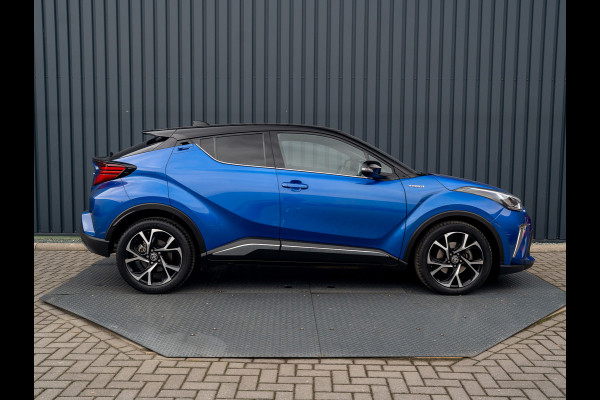 Toyota C-HR 1.8 Hybrid First Edition | Bi-Tone | JBL | Blind Spot | Navi | Pakeersensoren | Apple Carplay | Prijs Rijklaar!! Toyota C-HR 1.8 Hybrid First Edition | Bi-Tone | JBL | Blind Spot | Navi | Pakeersensoren | Apple Carplay | Prijs Rijklaar!!