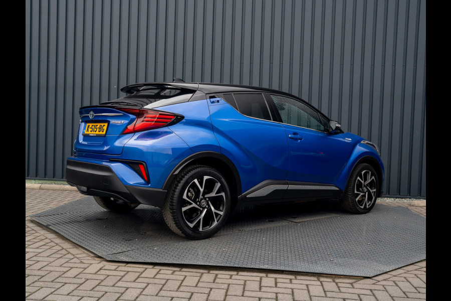 Toyota C-HR 1.8 Hybrid First Edition | Bi-Tone | JBL | Blind Spot | Navi | Pakeersensoren | Apple Carplay | Prijs Rijklaar!! Toyota C-HR 1.8 Hybrid First Edition | Bi-Tone | JBL | Blind Spot | Navi | Pakeersensoren | Apple Carplay | Prijs Rijklaar!!