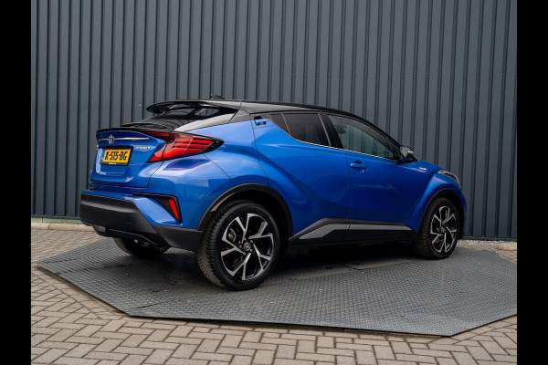 Toyota C-HR 1.8 Hybrid First Edition | Bi-Tone | JBL | Blind Spot | Navi | Pakeersensoren | Apple Carplay | Prijs Rijklaar!! Toyota C-HR 1.8 Hybrid First Edition | Bi-Tone | JBL | Blind Spot | Navi | Pakeersensoren | Apple Carplay | Prijs Rijklaar!!